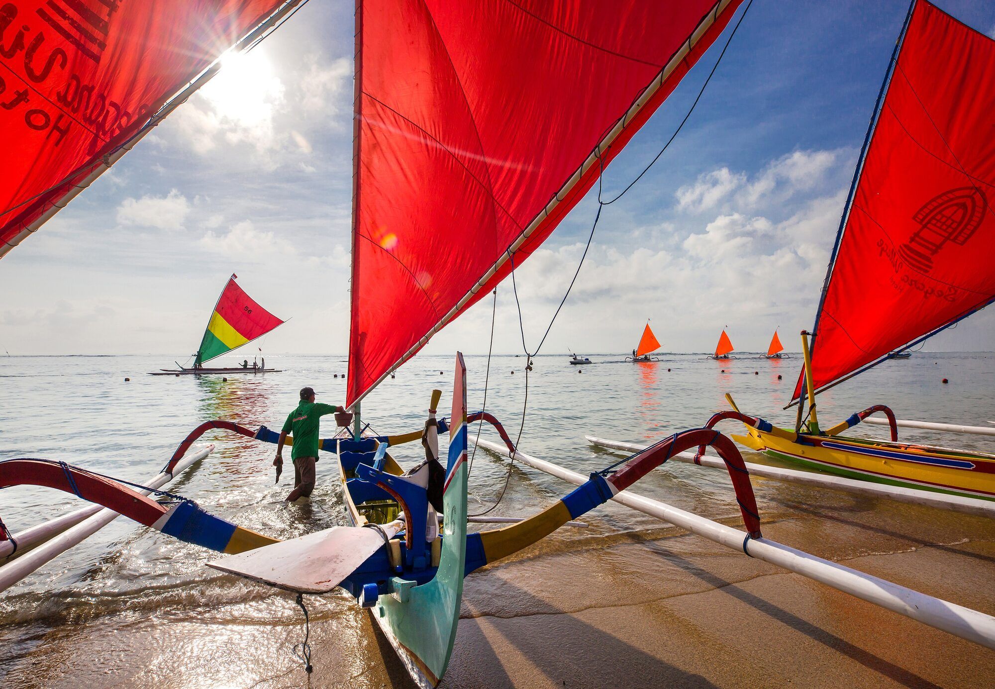 A traditional fishing boat on the beach at Sanur